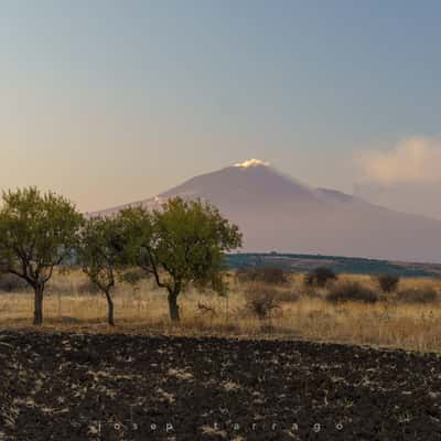 Road near Catania, view of Mount Etna, Italy