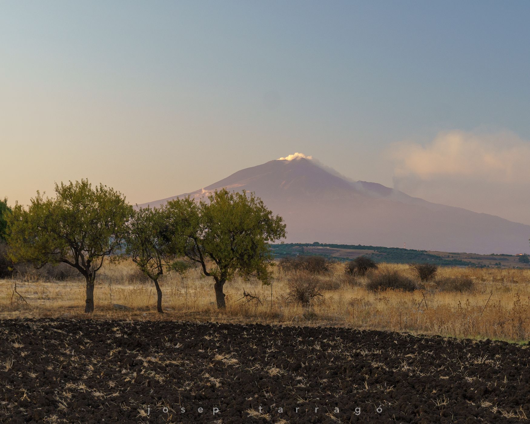 Road near Catania, view of Mount Etna, Italy