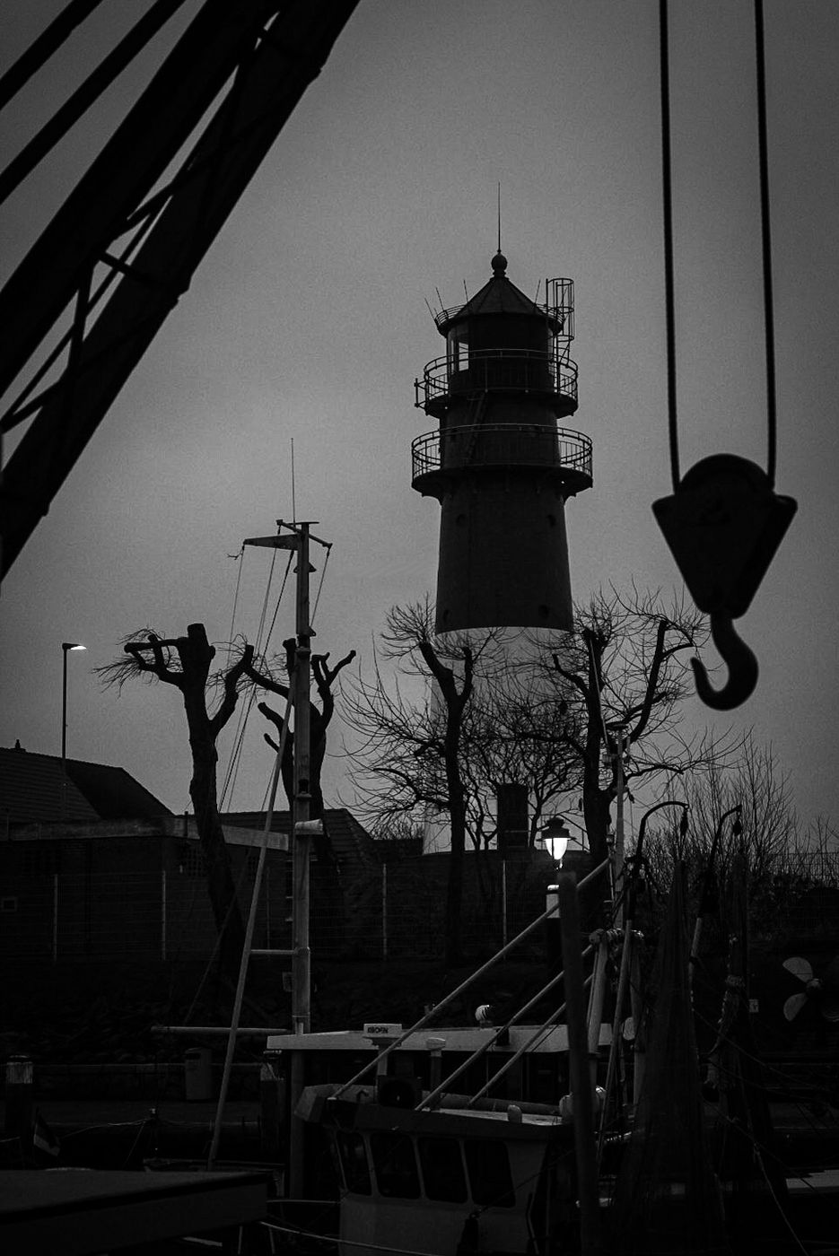 Lighthouse and port crane, Germany