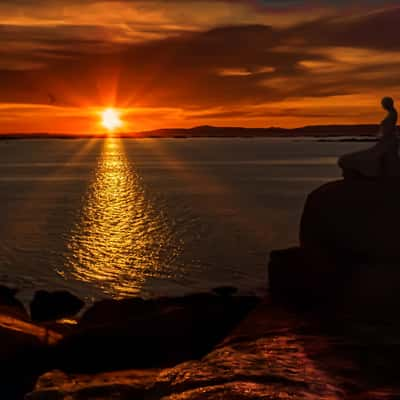 Posta de sol en Punta Moreiras, Spain