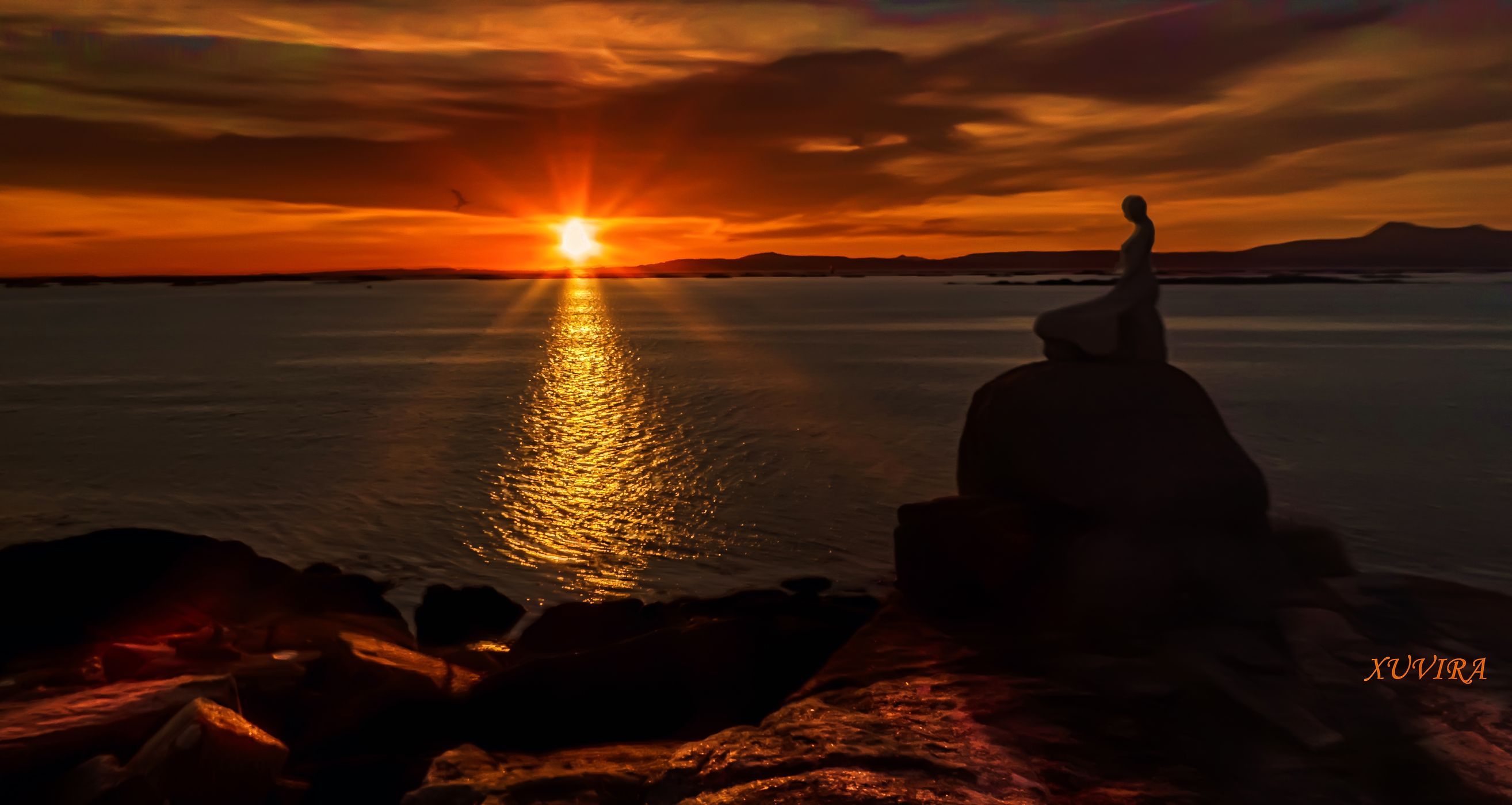 Posta de sol en Punta Moreiras, Spain