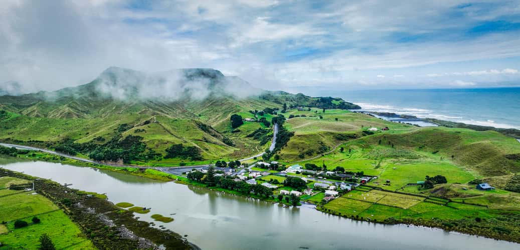 Cloud lifting town of Awakino, North Island