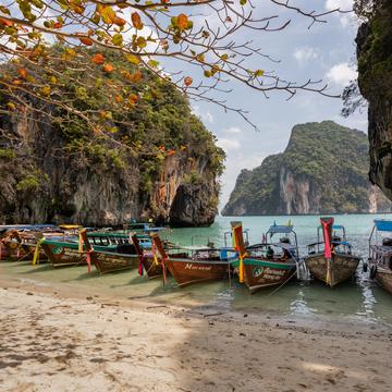 Long tail boats at Thai beach, Thailand