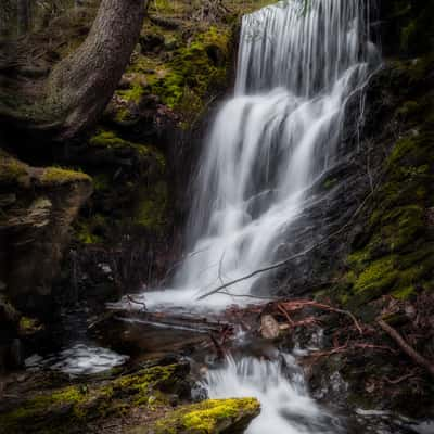 Small waterfall at the Herzberger pond, Germany