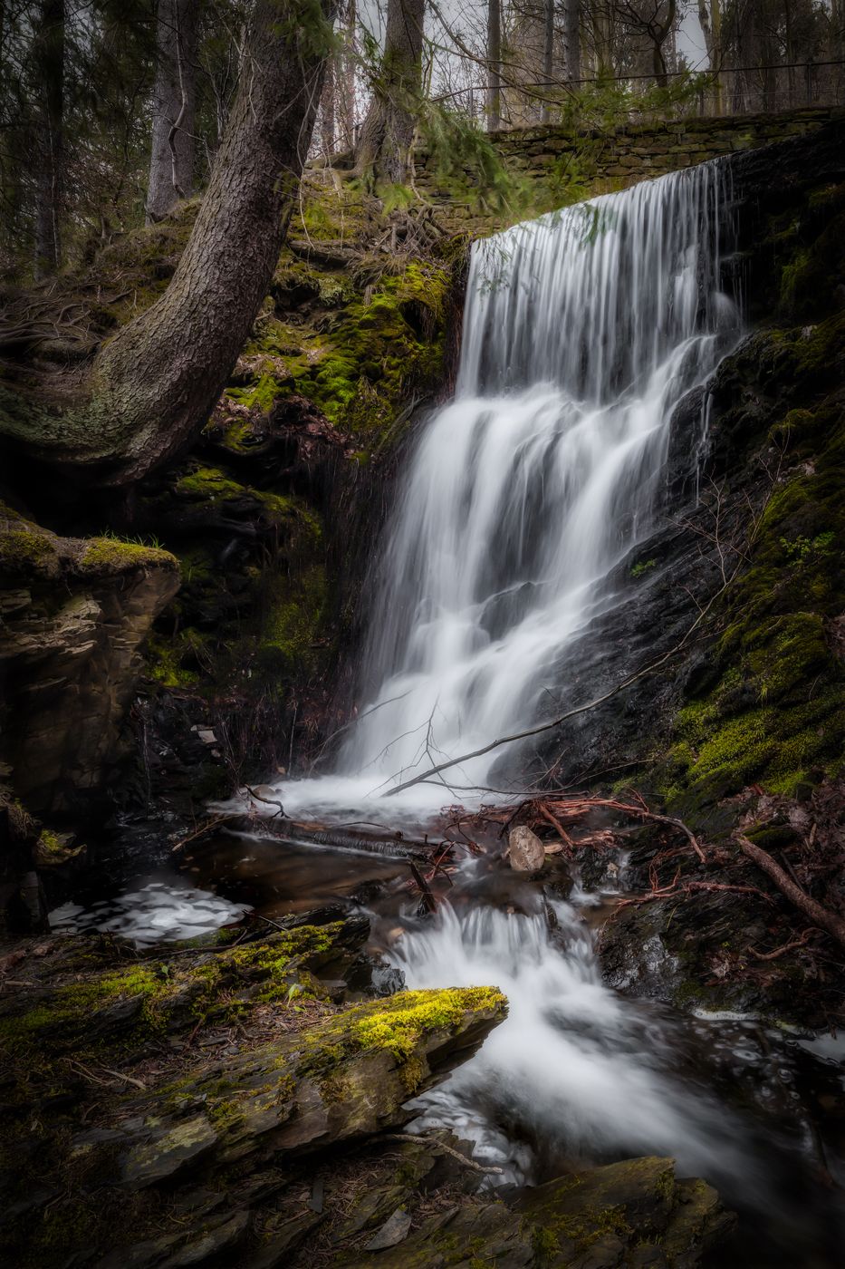 Small waterfall at the Herzberger pond, Germany
