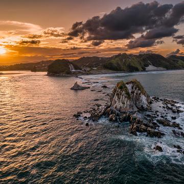 Sunrise Sentinel Rock, Mangawhai Heads, North Island, New Zealand