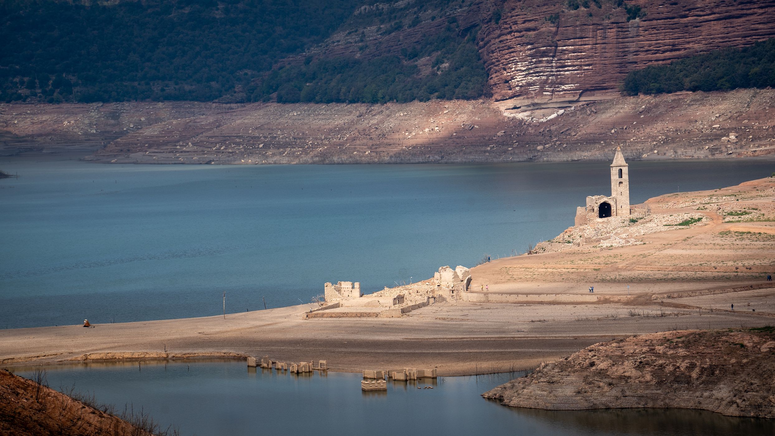 Church of Sant Roma de Sau seen from the shore, Spain