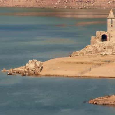 Church of Sant Roma de Sau seen from the shore, Spain