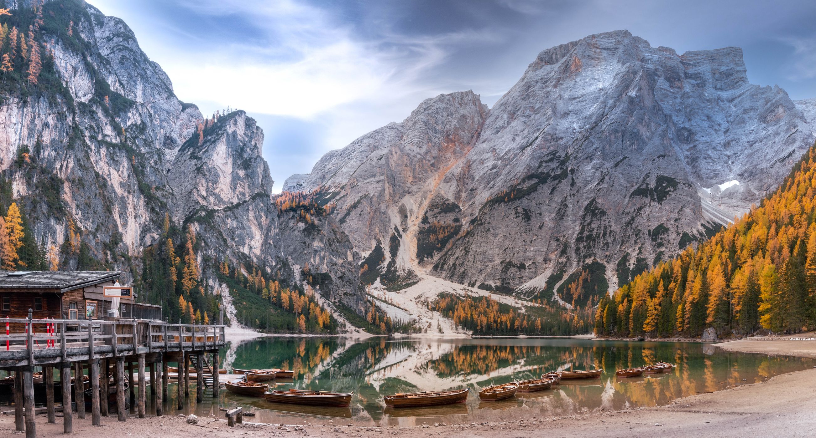 Wooden house on Lago Braies in Dolomites, Italy