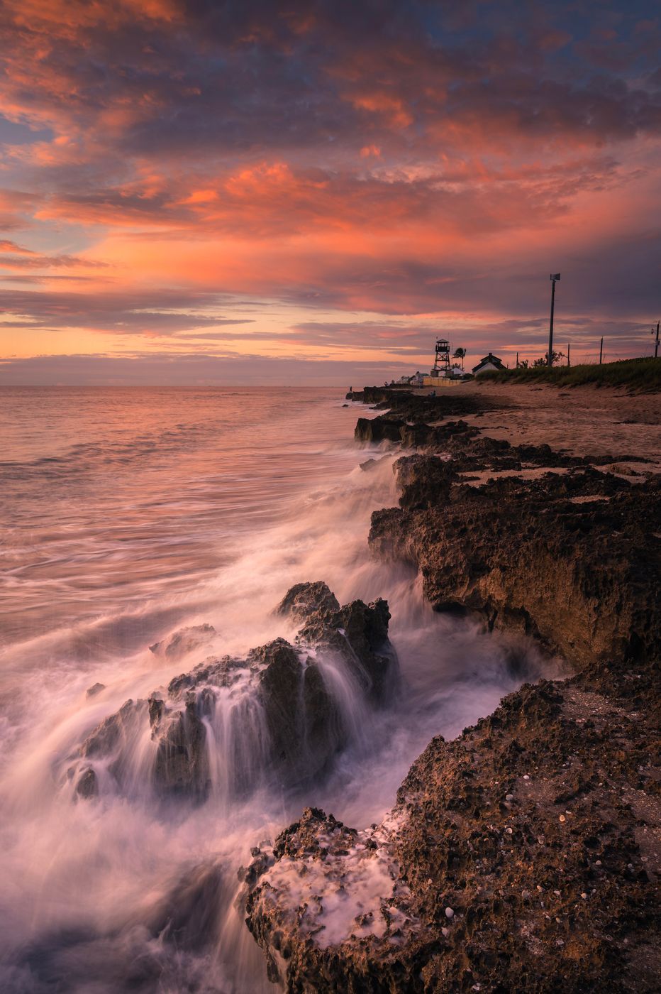 House of Refuge shot from rocky beach, USA
