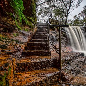 Stairs and falls Weeping Rock, Wentworth Falls, NSW, Australia