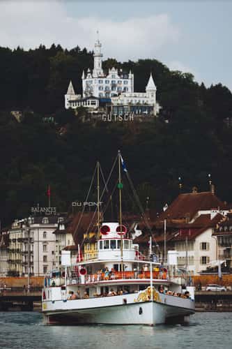 Boat and Chateau Gütsch view, Lucerne