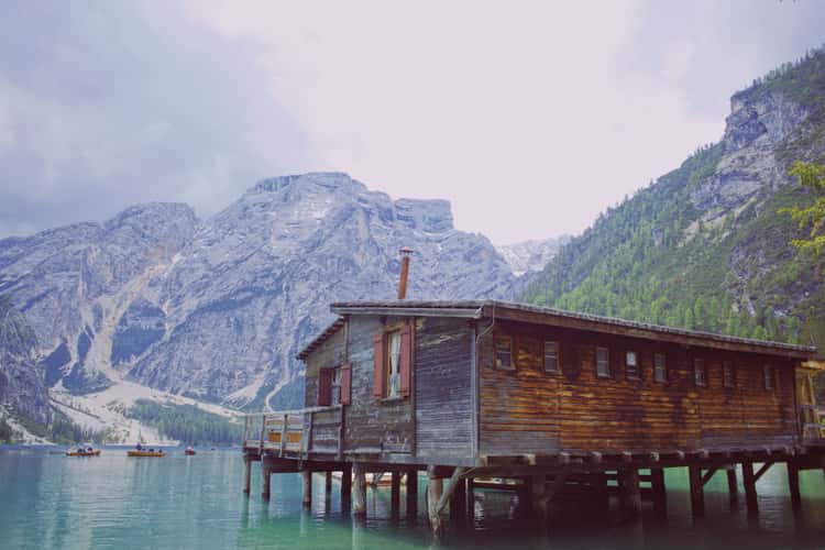 Wooden house on Lago Braies in Dolomites