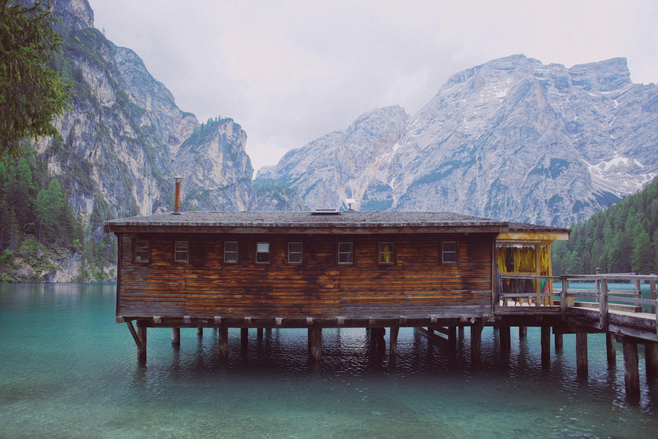 Wooden house on Lago Braies in Dolomites, Italy