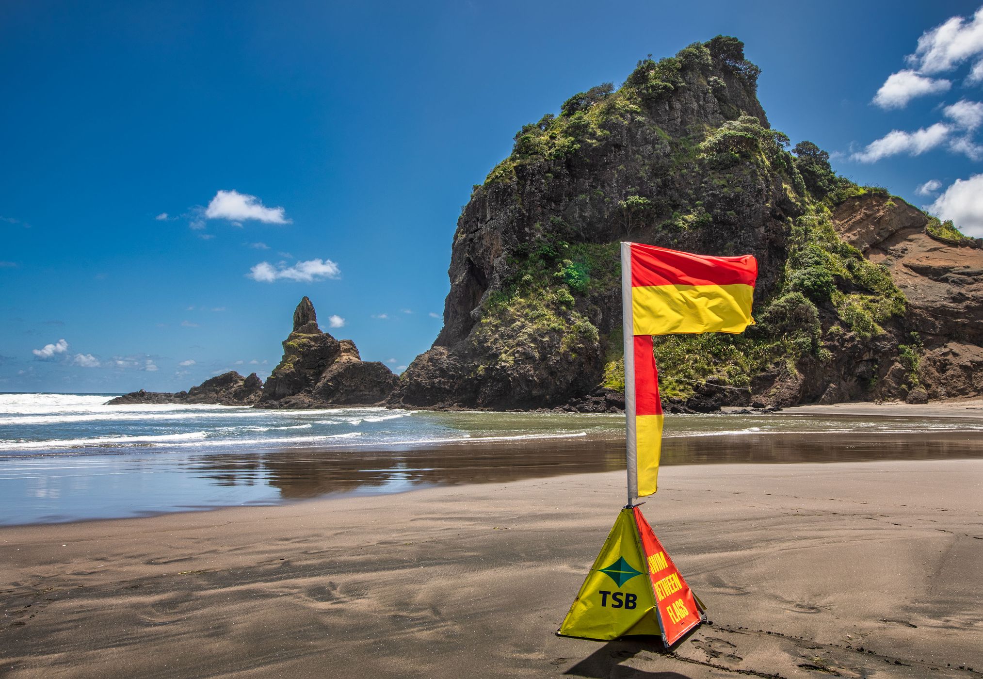 life saver flag Piha, North Island, New Zealand