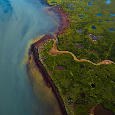 Orange river meets blue river, Iceland