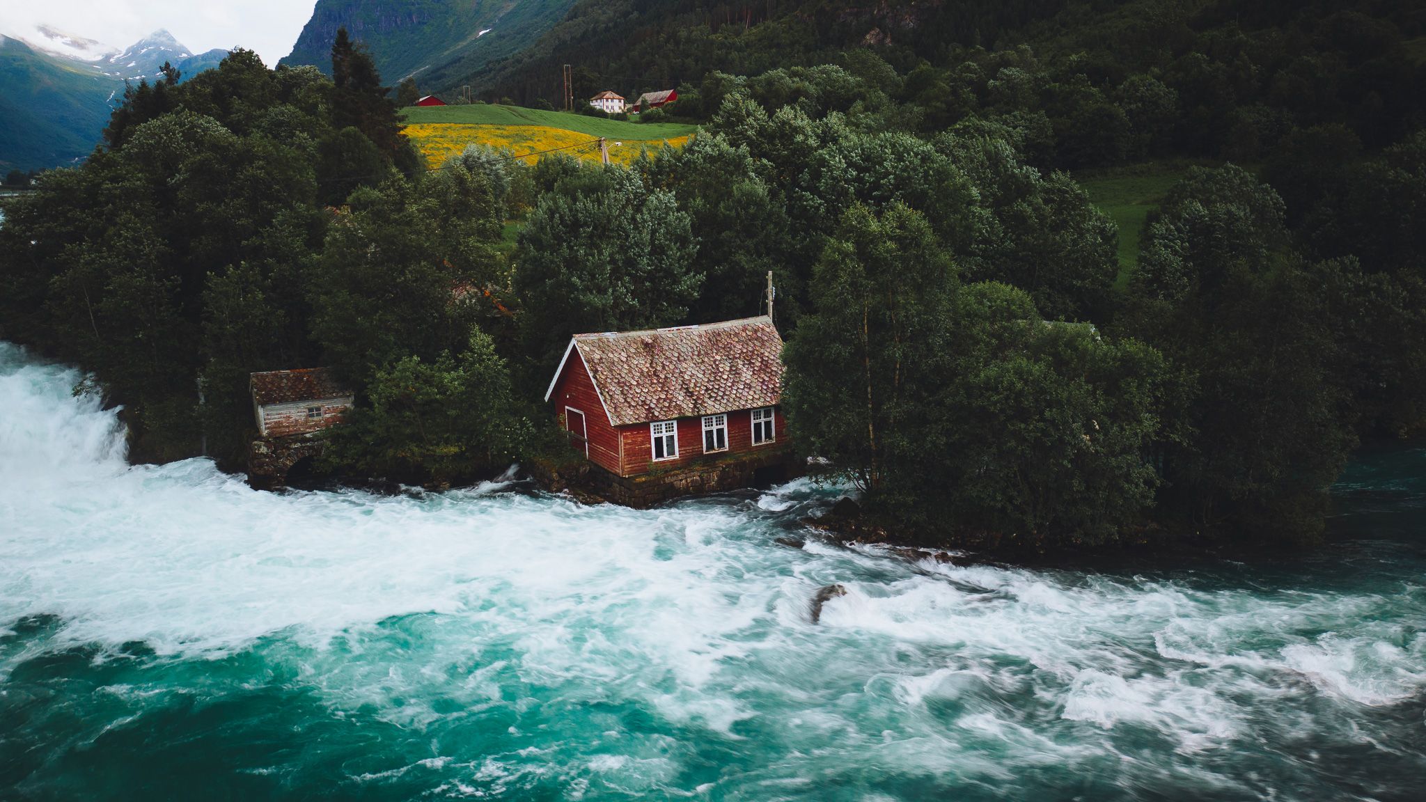 Red cabin near river Oldeelva, Olden, Norway