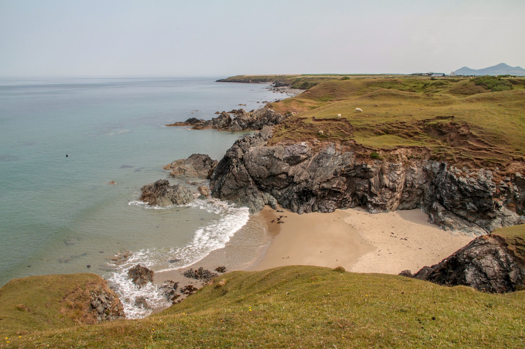 Secluded cove at Porth Towyn, United Kingdom