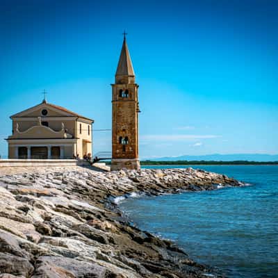 Caorle Lighthouse and Ciesa Madonna dell'Angelo, Italy