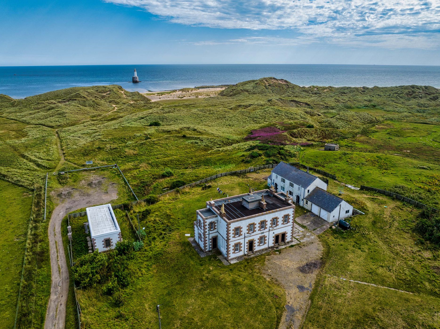 Lighthouse cottages, Rattay Head Lighthouse, Scotland, UK, United Kingdom