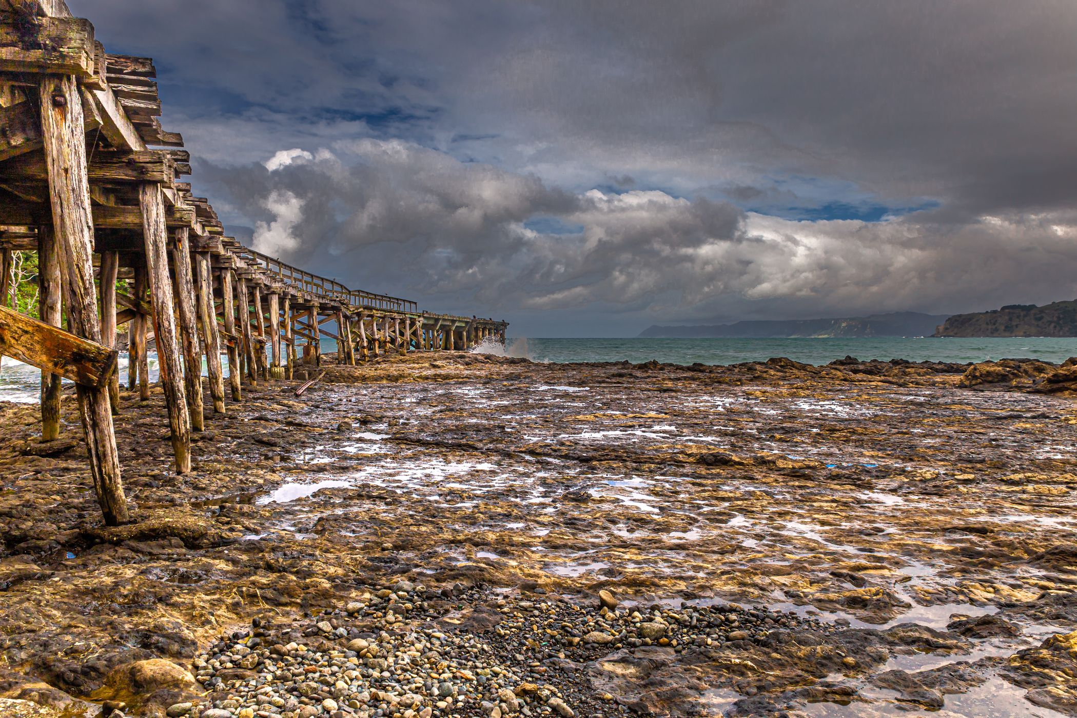 old pier in Hicks Bay, New Zealand