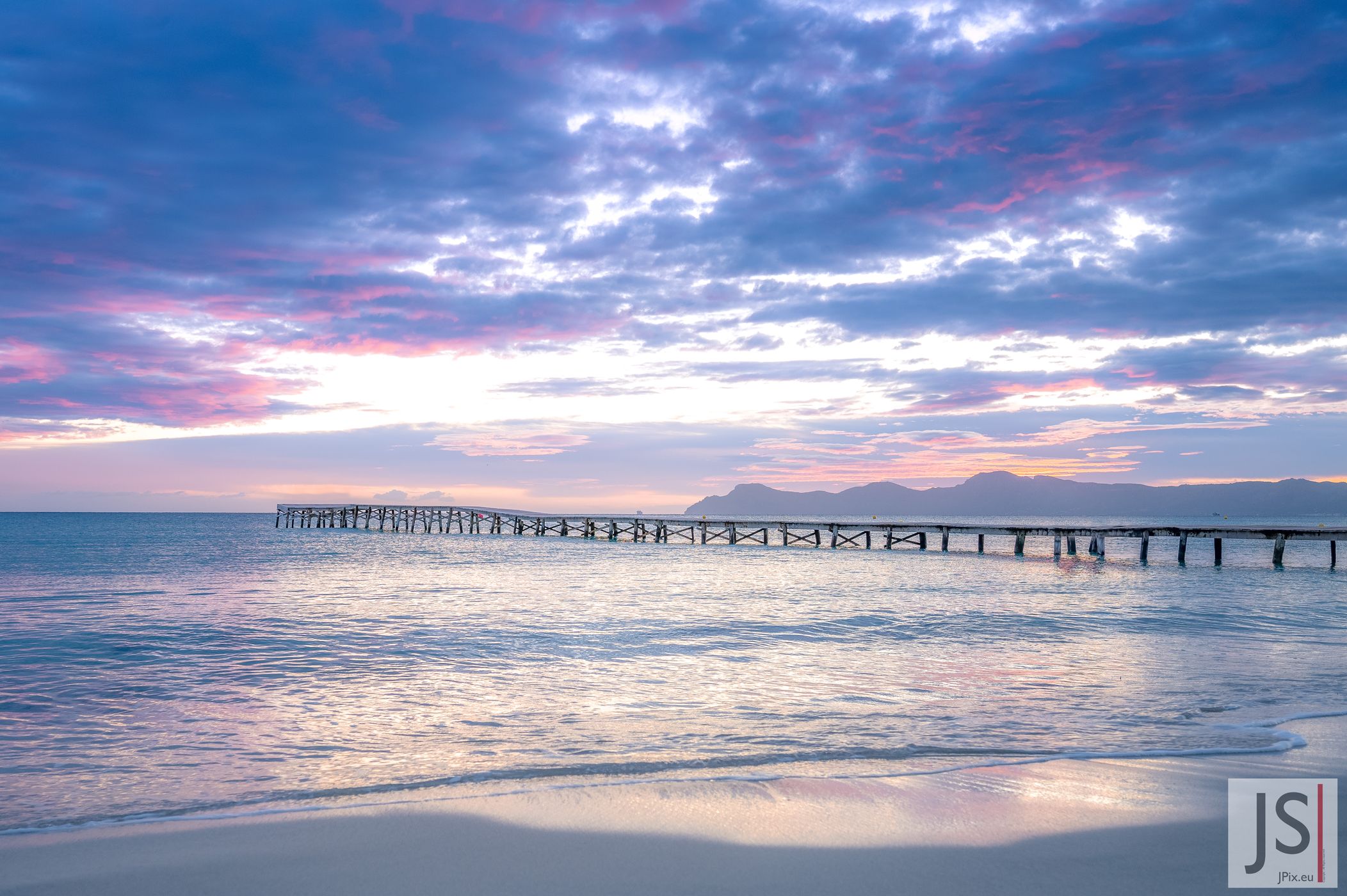 Wooden walkway at Playa de Muro from the side, Spain