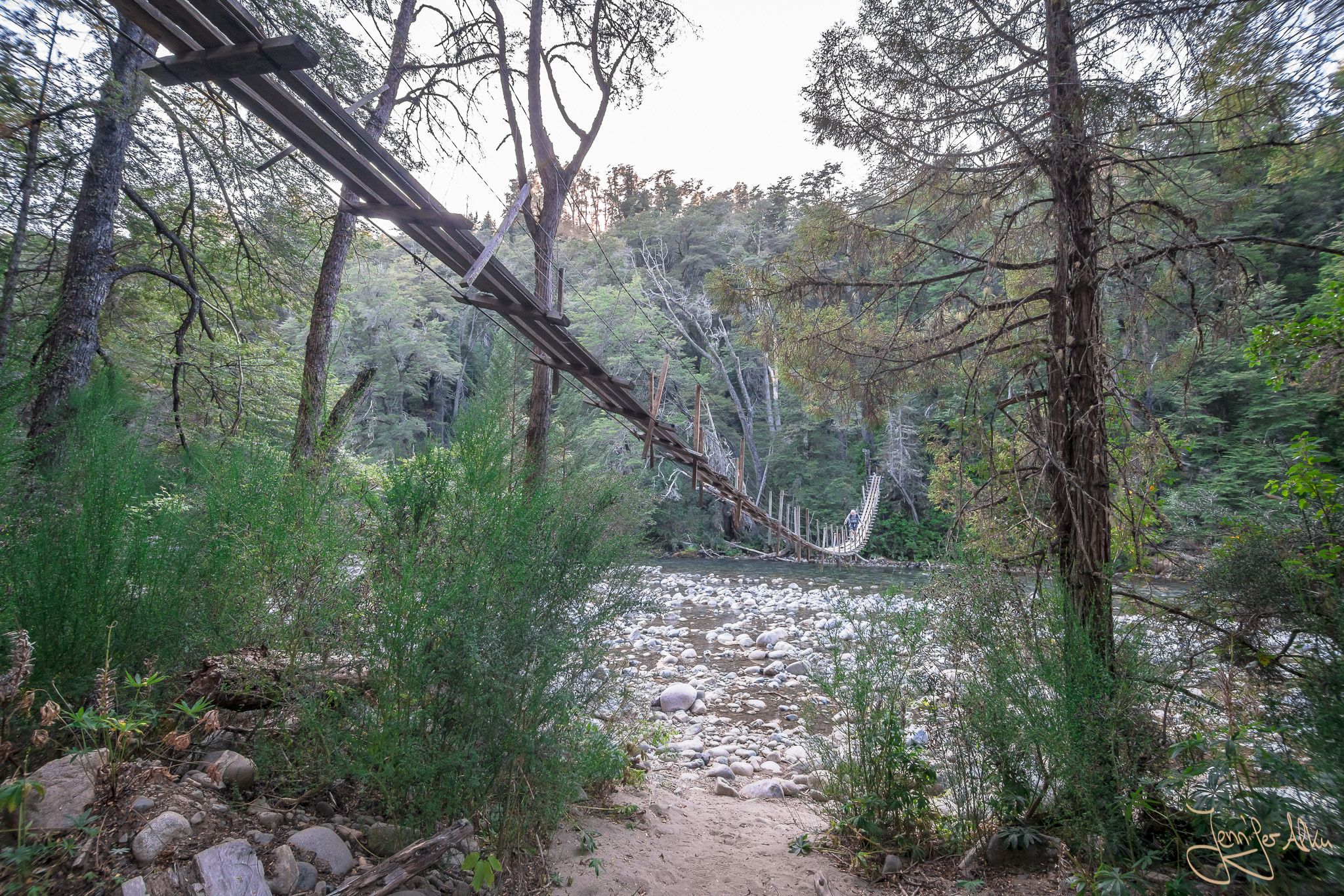 Suspension bridge over the Rio Azul near El Bolson, Argentina