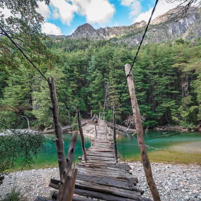 Wooden bridge over river Rio Azul, El Bolson, Argentina