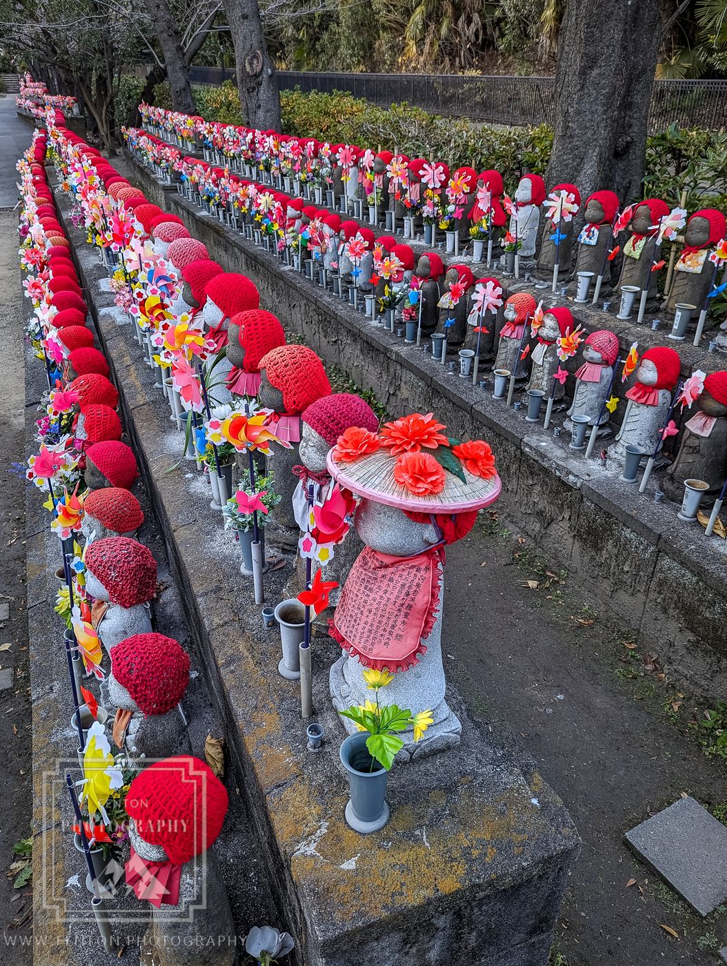 Line of child statues Zojo-ji Temple Cemetery Tokyo, Japan