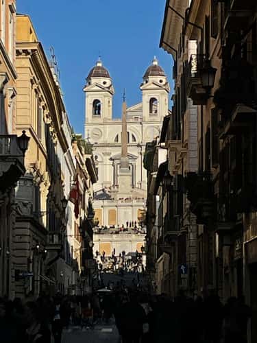 The Spanish Steps framed by buildings (telephoto)