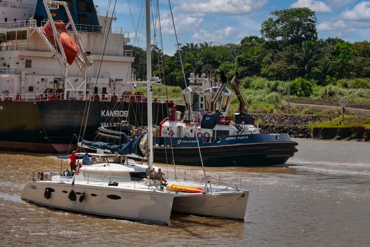 Sail boat traveling the Panama Canal. Panama