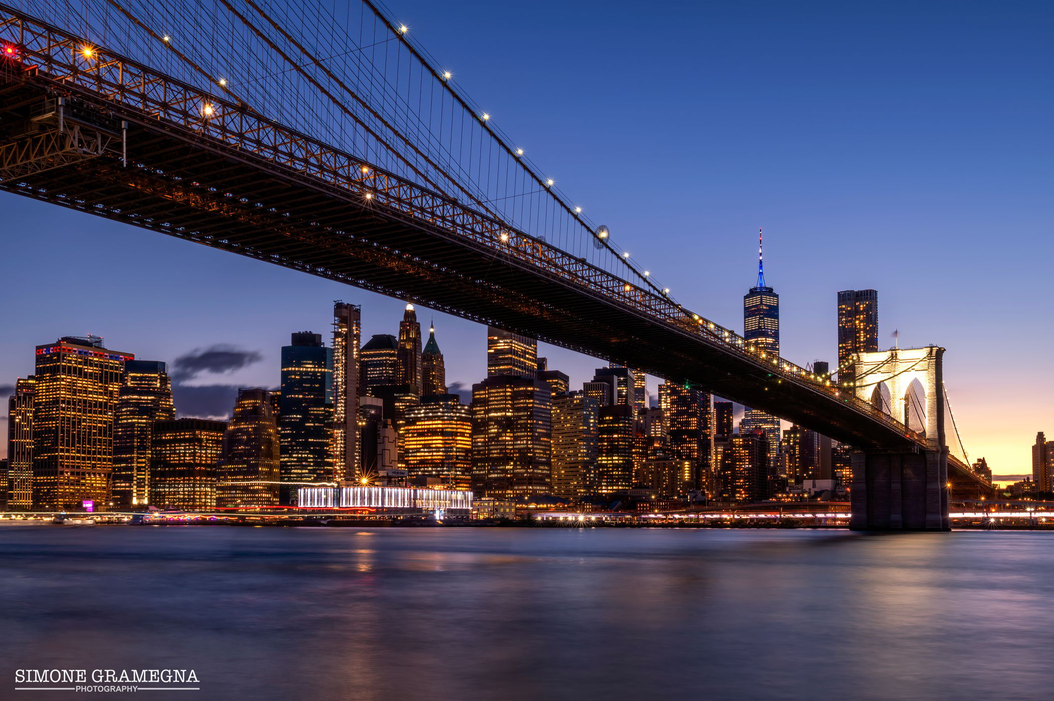 Brooklyn Bridge skyline from Pebble Beach, New York City, USA