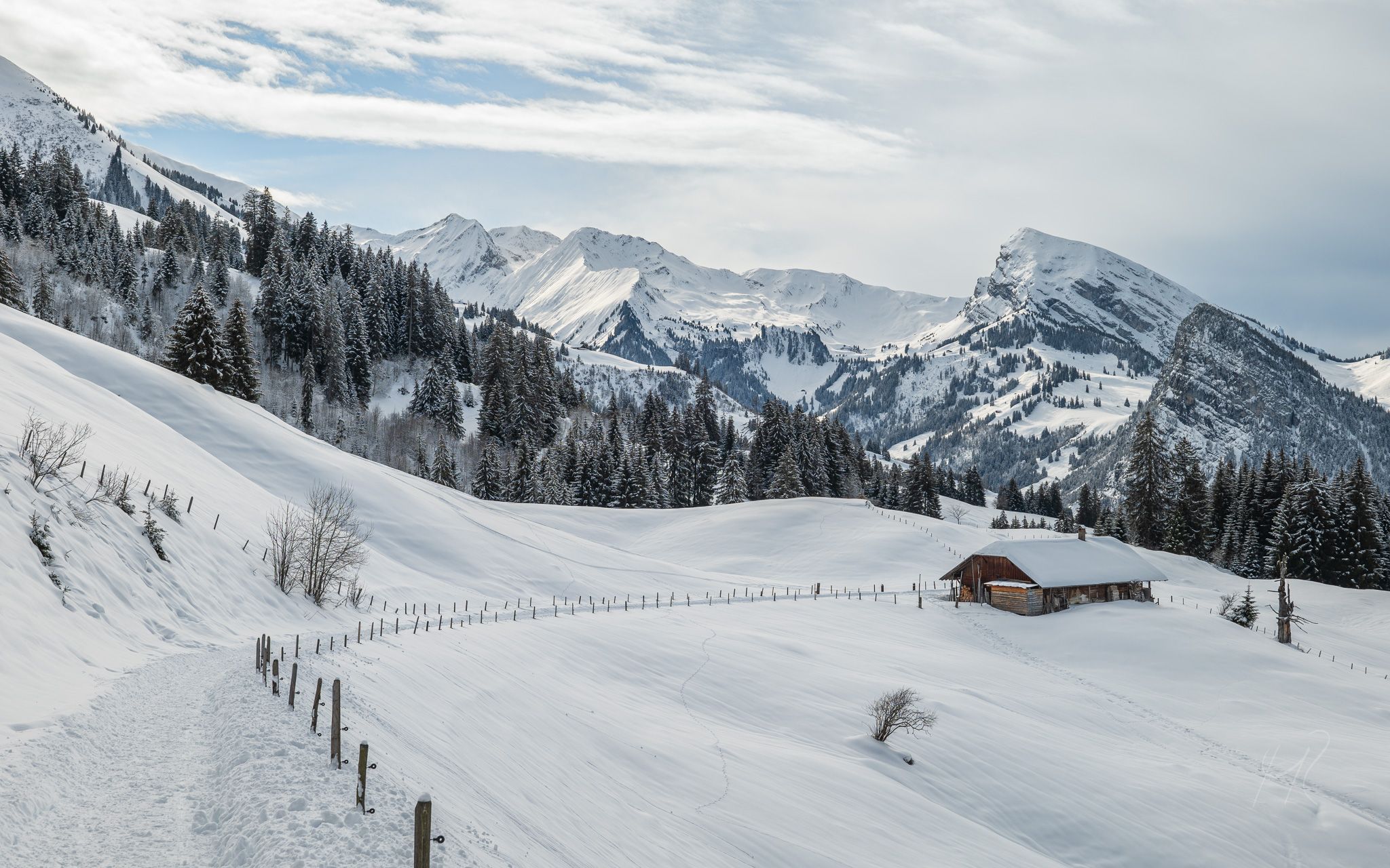 Lonely mountain hut in a winter wonderland, Switzerland