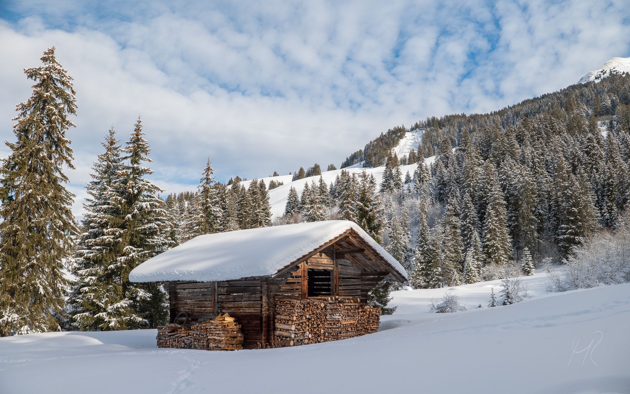 Snow-covered mountain shed, Switzerland