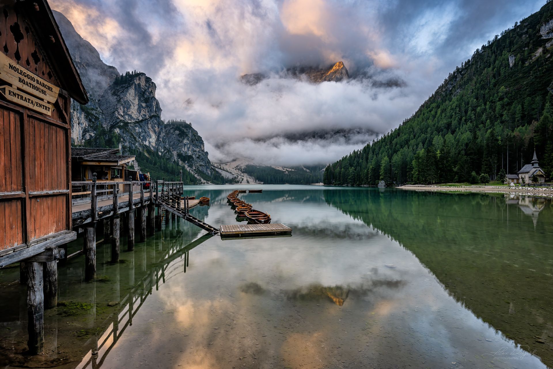 Wooden house on Lago Braies in Dolomites, Italy