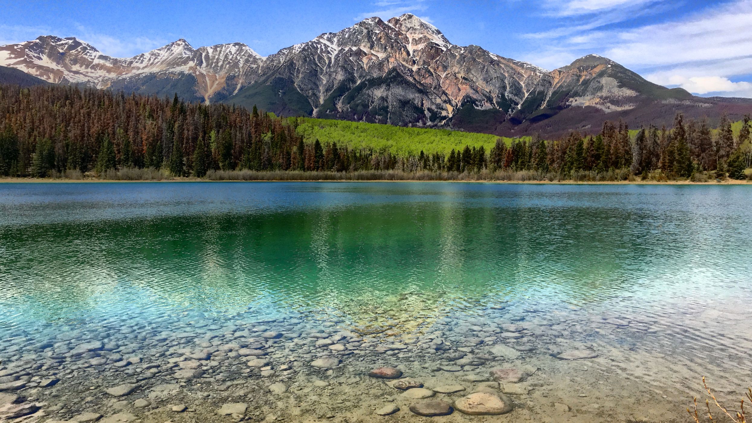 Pyramid lake with Mt Edith Cavell as distant background, Canada