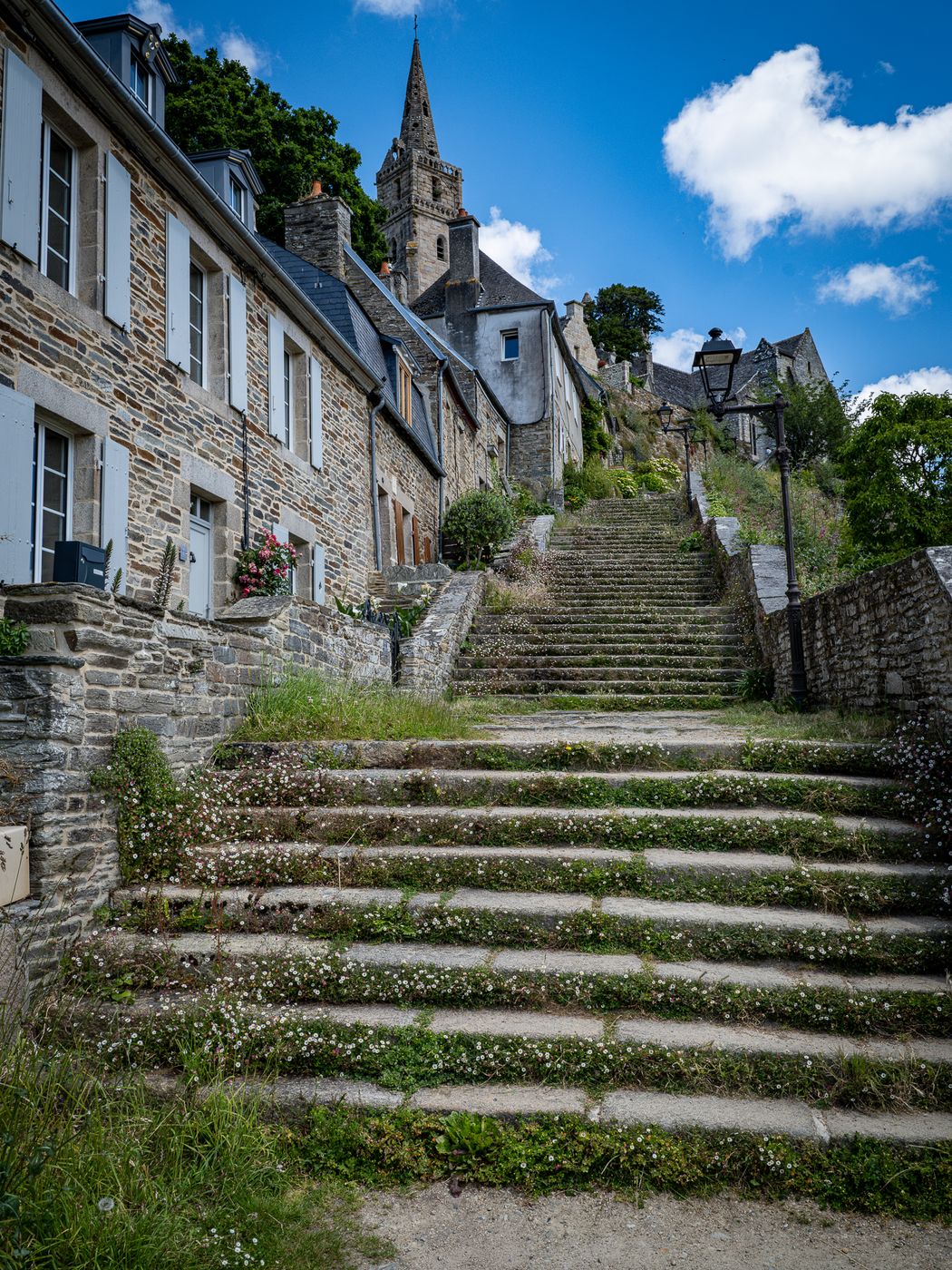 Steps to the Eglise de la Sainte-Trinite de Brelevenez, France