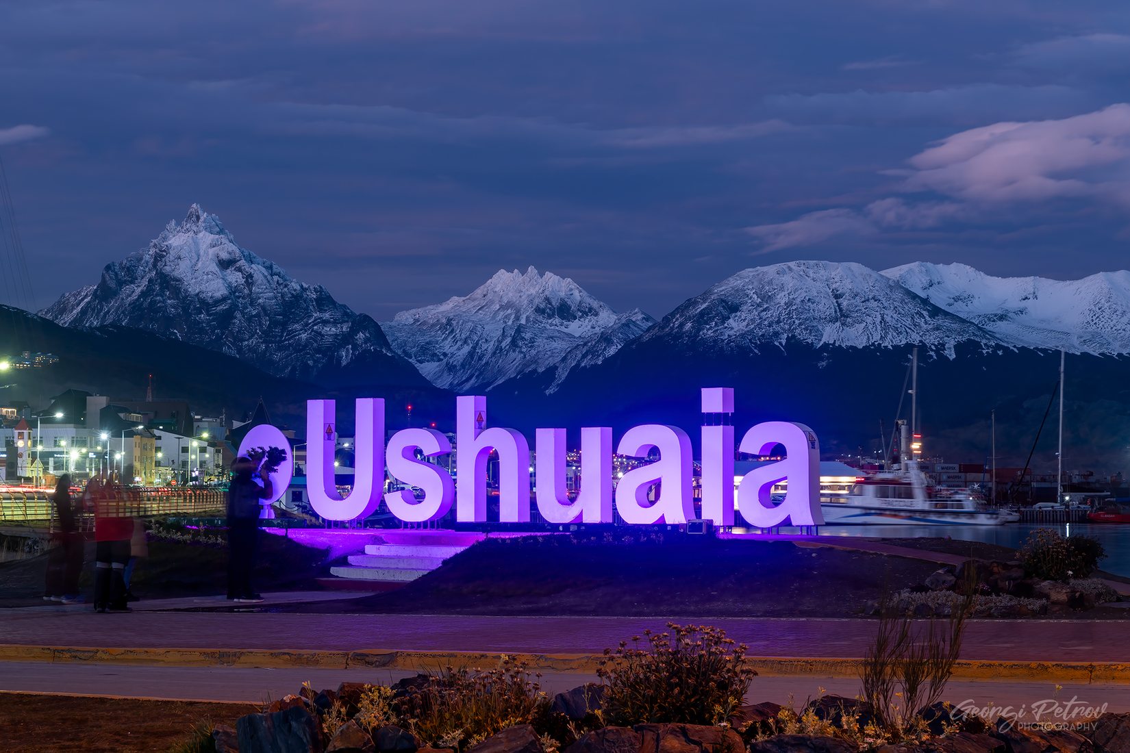 Ushuaia cartel with Mount Olivia and Cerro Cinco Hermanos, Argentina