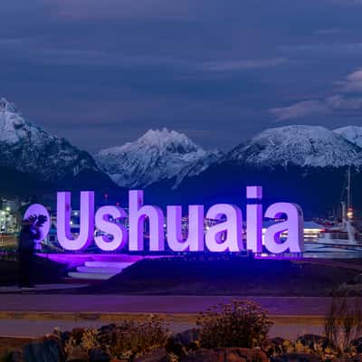 Ushuaia cartel with Mount Olivia and Cerro Cinco Hermanos, Argentina