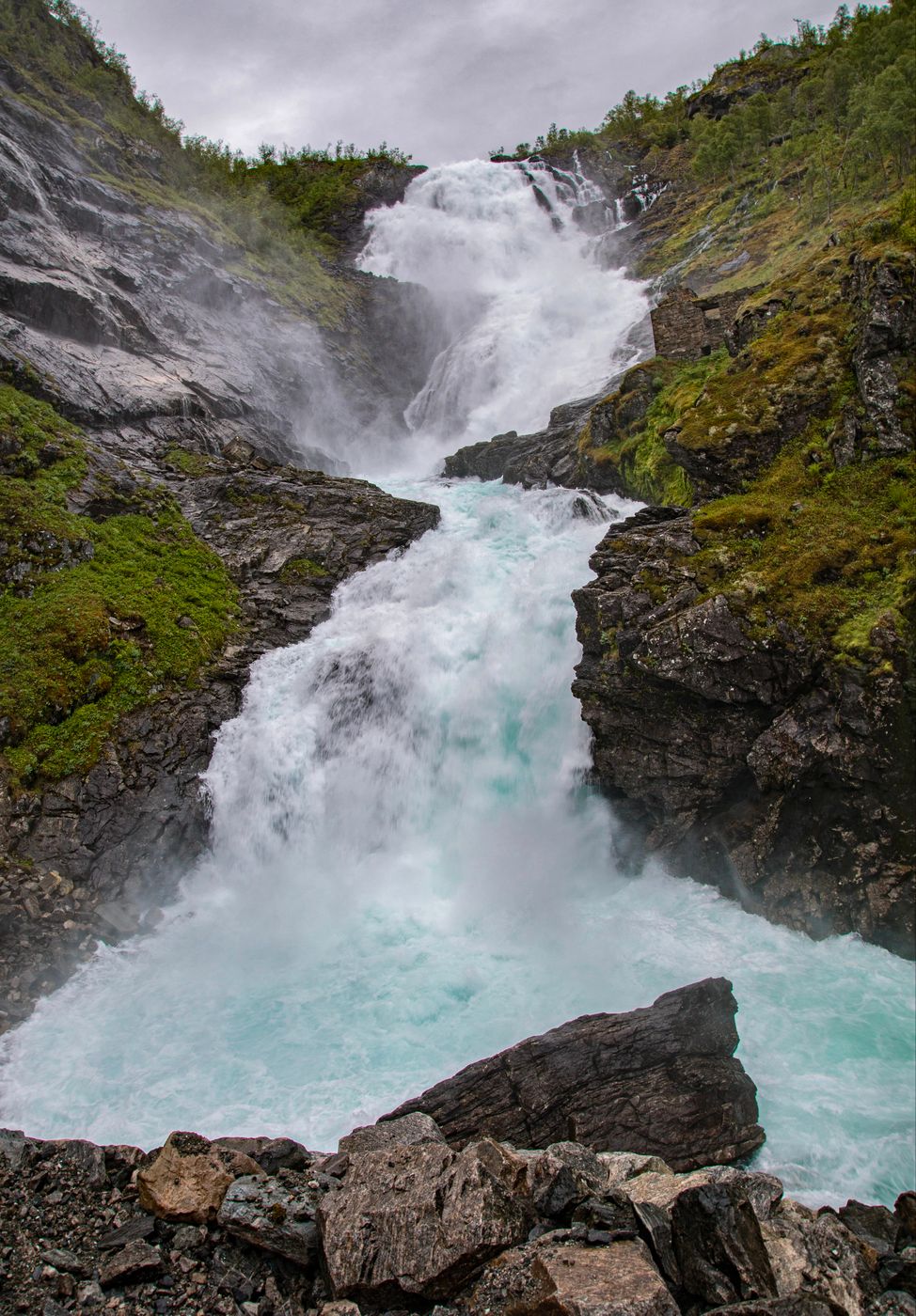Huldra singing in front of Kjossfossen, Norway
