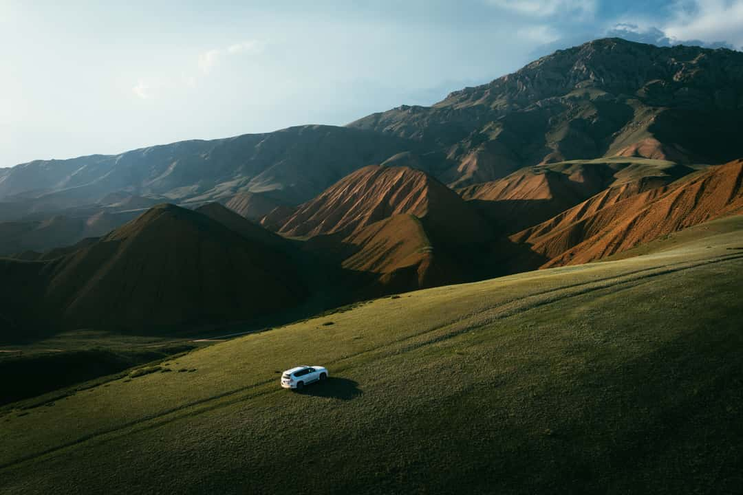 Get the exact geo-position for this spot: Red hills near Naryn