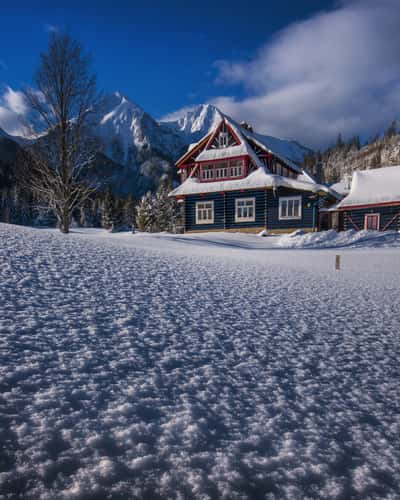 Tatras mountains with traditional wooden house