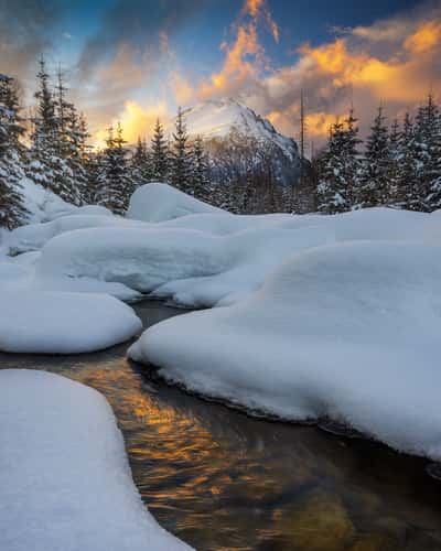 View of Slavkovský peak with mountain stream