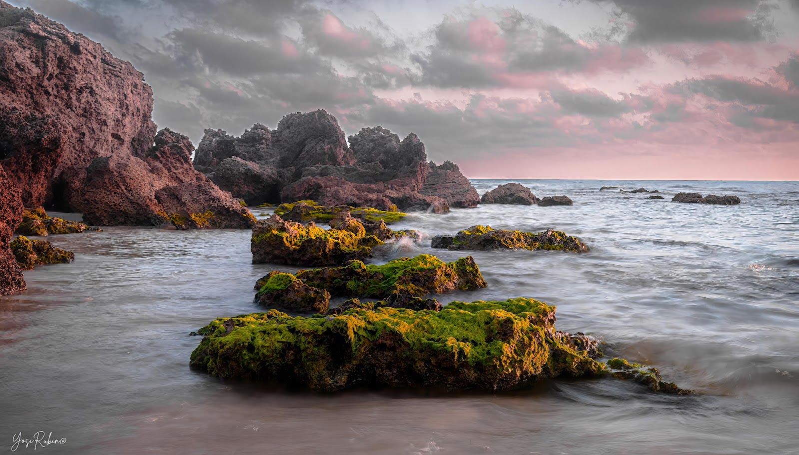 Beach rocks in sunset, Israel