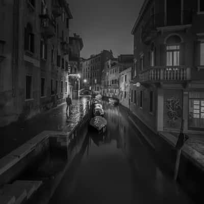 Walking alone through Venice., Italy