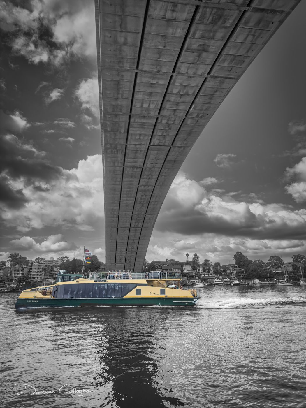 Ferry under Gladesville Bridge, Parramatta River, Sydney, Australia