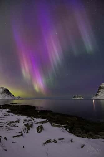 Polar light over Vik Beach and Haukland Beach