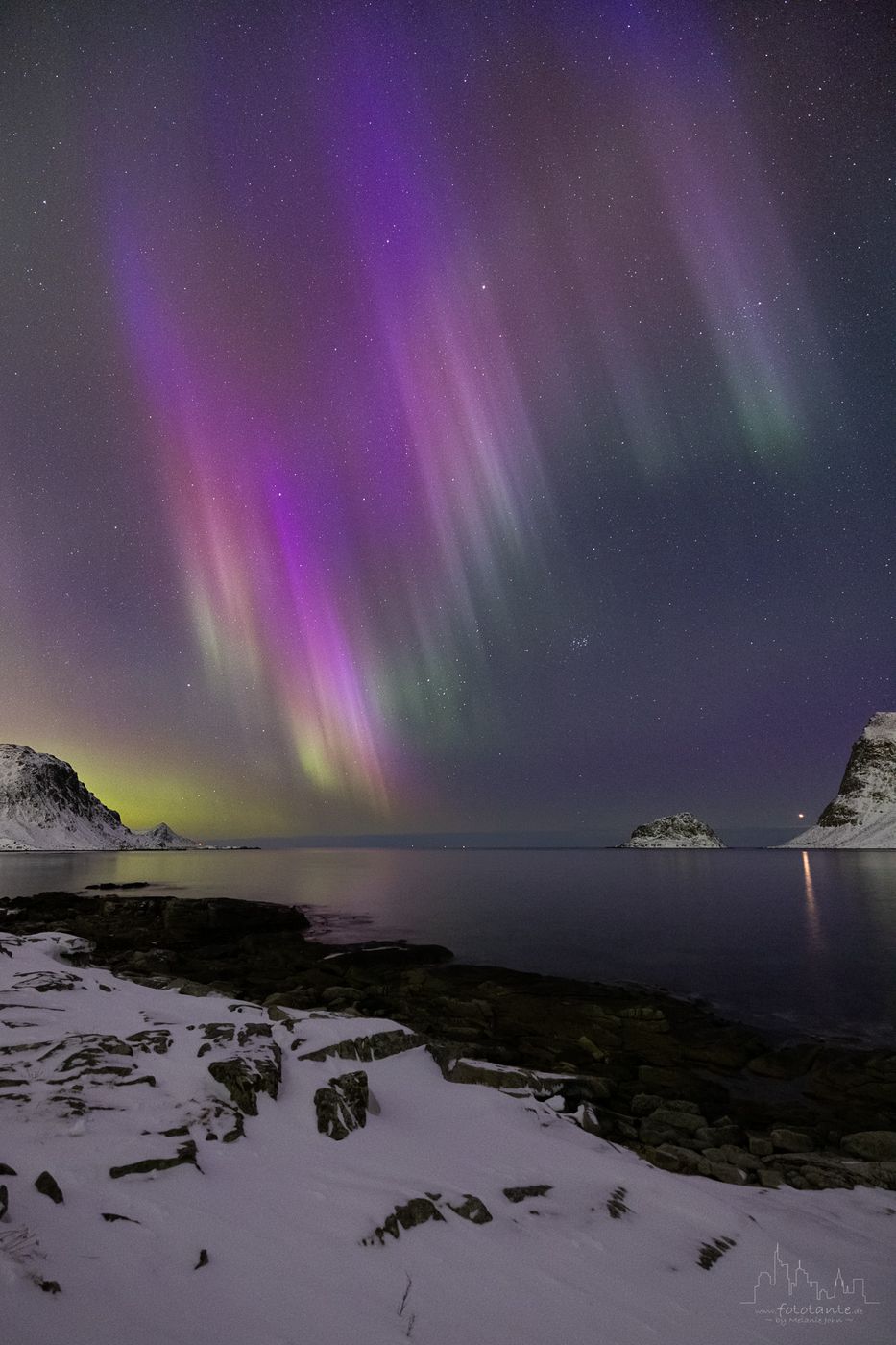 Polar light over Vik Beach and Haukland Beach, Norway