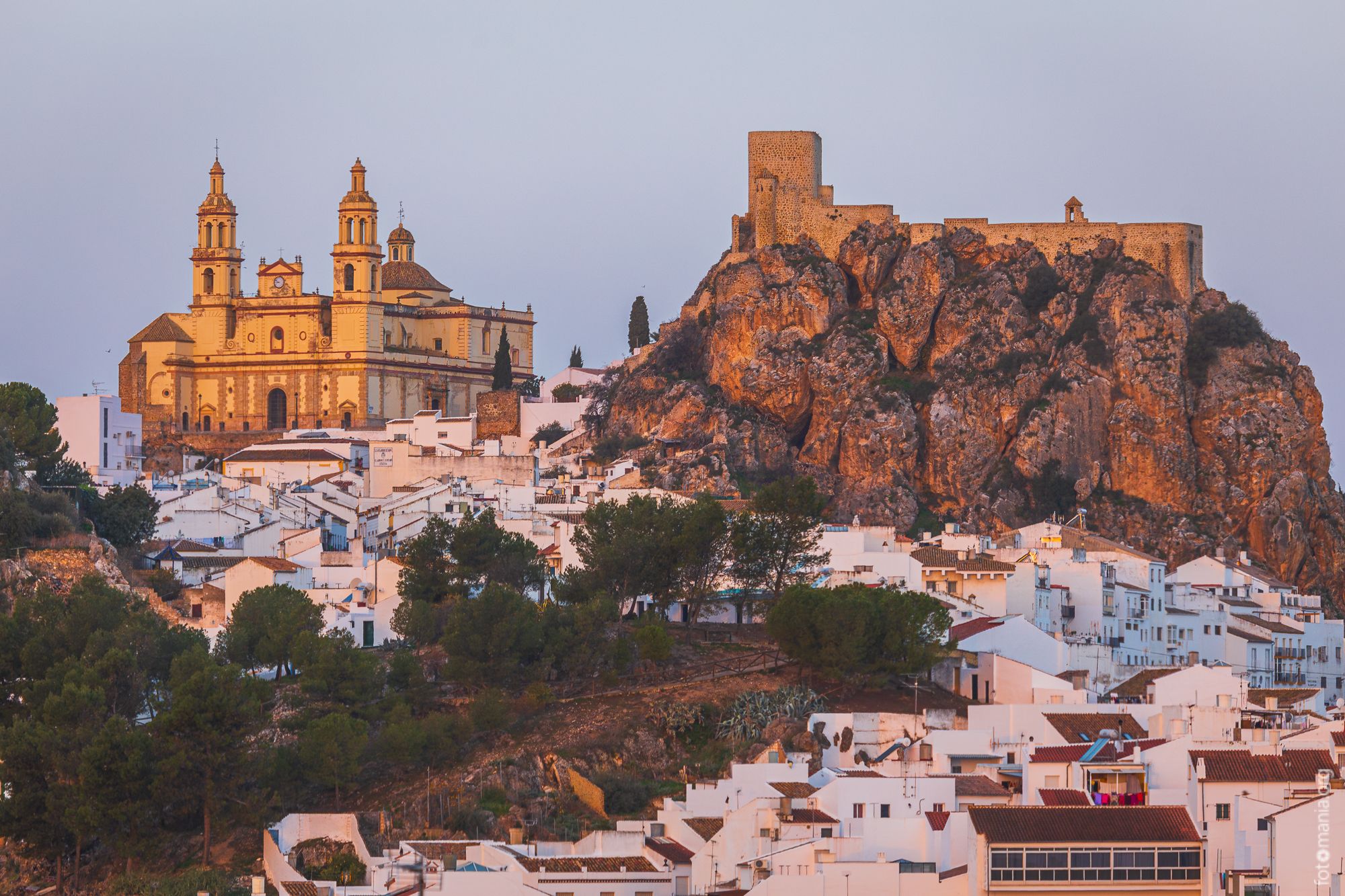 View to castle and church of Olvera, Spain
