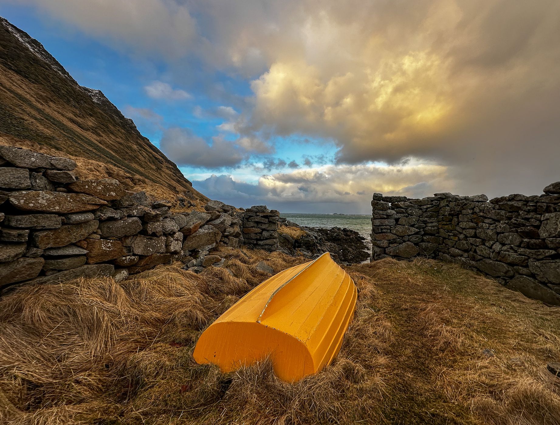 Beach houses with a view of Sandøya, Lofoten, Norway